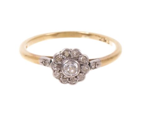 Edwardian diamond cluster ring with a daisy cluster of old cut diamonds in platinum setting on 18ct gold shank, ring size O.T