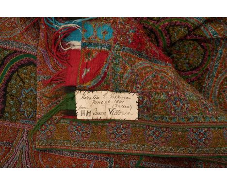 The gift of H.M. Queen Victoria, fine Indian Kashmir shawl of intricate traditional design including with figures with sewn l