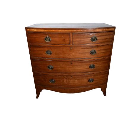 Regency mahogany and satinwood crossbanded bowfront chest of drawers, having two short over three long drawers on splayed bra