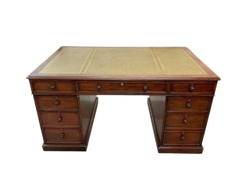 Early Victorian mahogany partners' desk, with leather inset top and nine drawers to the kneehole with three drawers and twin 