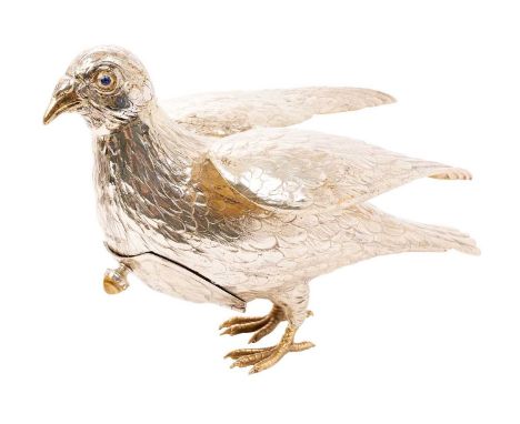 Early 20th century Continental silver model of a dove, with glass eyes and silver gilt feet, suspension ring to back and hing