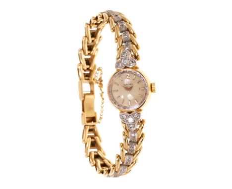 1960s Omega 18ct gold and diamond ladies' cocktail watch, the circular dial with an applied gold 12 o'clock and baton markers