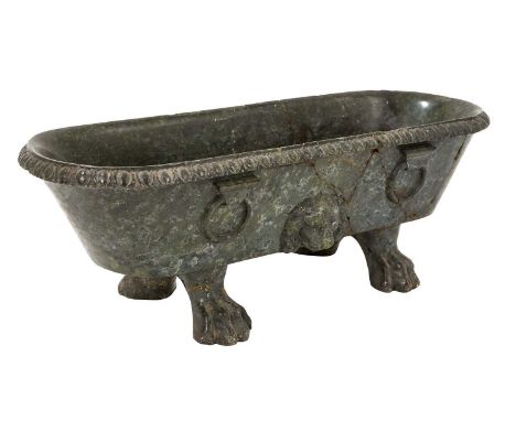 Grand Tour serpentine marble model of a Roman Bath, raised on lion paw feet, 28cm longHas been broken into several pieces and