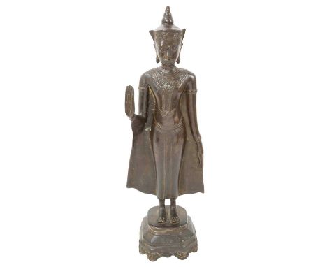 17th century Thai bronze Buddha figure, depicted in serene standing pose on canted rectangular base, 38cm high