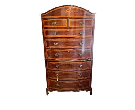 19th century mahogany and satinwood crossbanded bowfront chest on chest, with arched cornice and two short over six long grad
