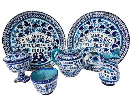 An unusual group of early 20th century Indian pottery relating to the Rifle Brigade ‘R.S.M. James Gill’, including a teapot, 