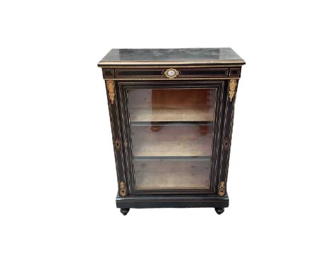 Victorian ebonised and gilt metal mounted pier cabinet, with porcelain floral plaque to the frieze and enclosed by glazed doo