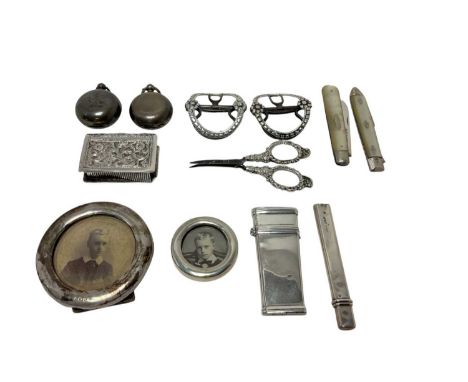 Selection of miscellaneous silver, including two sovereign cases, pair buckles, mother of pearl handled fruit fork and simila