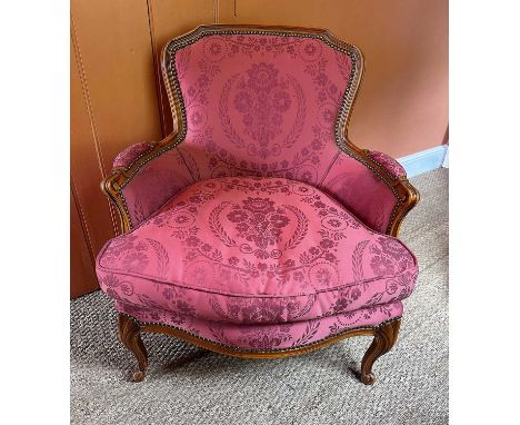 Louis XVI style armchair with channel carved showwood frame and terracotta floral upholstery