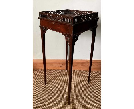 George III kettle stand in the manner of Chippendale, with pierced square gallery and candle slide on slender square tapered 
