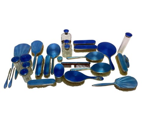 Large selection of first half 20th century, silver and blue guilloché enamel dressing table items, including cut glass jars a