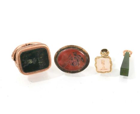 Group of antique seals to include a Regency yellow metal seal with snake surmount and intaglio crest to the bloodstone seal, 