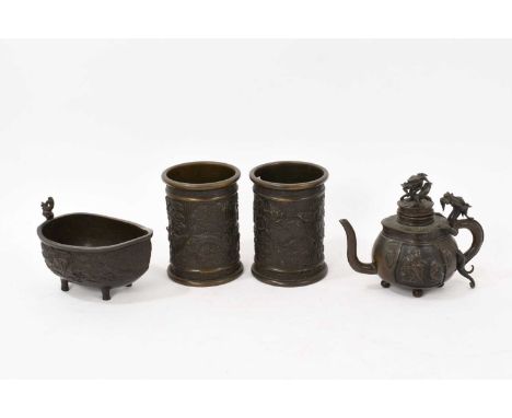 Group of Chinese bronzes, including a pair of brush pots, each moulded with dragon relief, 12.5cm high, together with a boat 