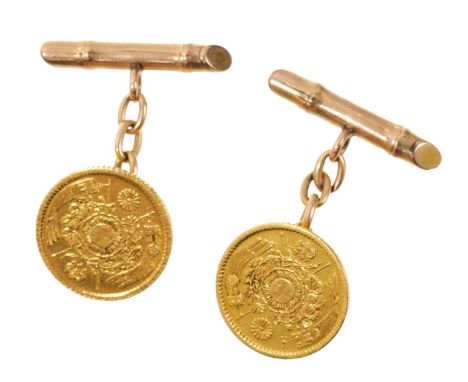 Pair of Chinese gold coin cufflinks, each with a Chinese gold coin mounted as cufflinks.The mounts are stamped K18 but have n