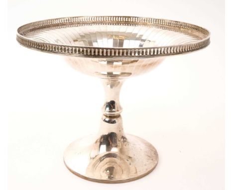 1930s silver pedestal dish of circular fluted form, with pierced gallery, in the Art Deco style, on a shaped column and circu
