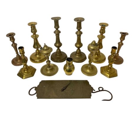 Antique brass and metalwork to include pair of bronze candlesticks with spun bases, two pairs of Georgian candlesticks with s