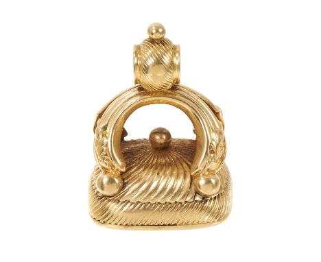 Regency yellow metal seal, the carnelian seal with finely carved intaglio armorial crest, 30mm.