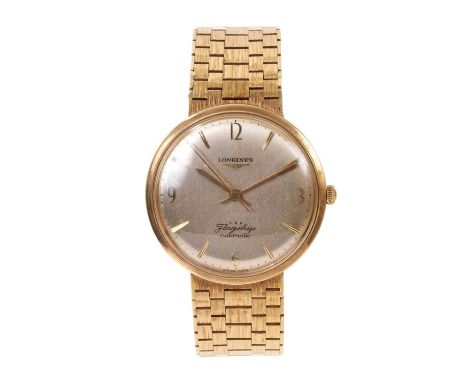Longines Flagship automatic 9ct gold wristwatch, the circular silvered dial with applied Arabic numeral and baton markers in 