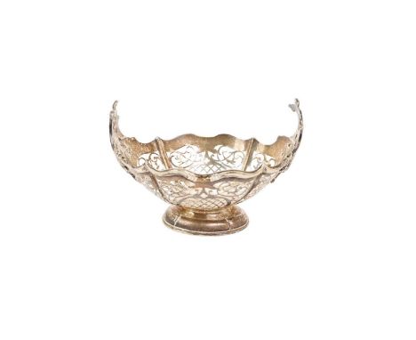 1930s silver dish of boat form, with pierced decoration and scroll handles, on an oval base (Sheffield 1936) Frank Cobb &amp;