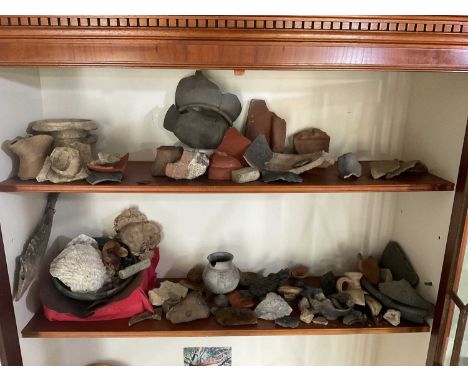 Roman and mediaeval artefacts, with worked flints and other antiquities