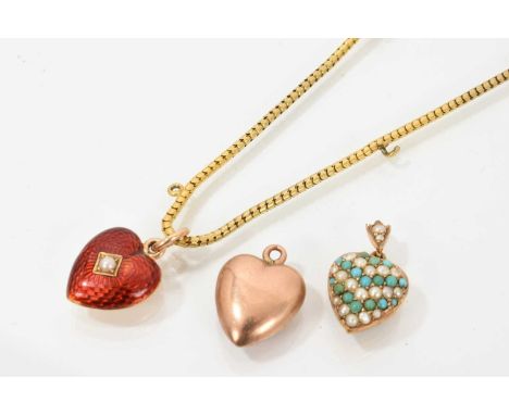 Victorian gold and enamel heart shape pendant with a central seed pearl on red guilloché enamel ground, engraved '15ct &18ct'