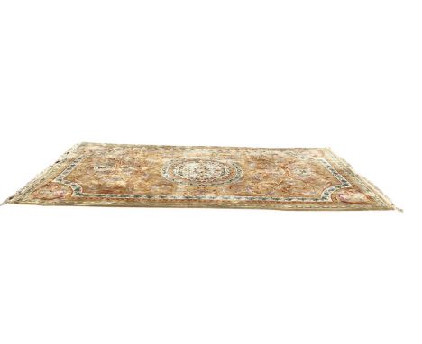 Large Chinese rug with floral decoration on beige, cream and green ground, 491cm x 277cm