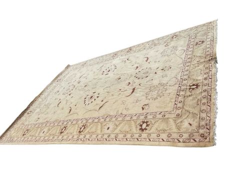 Ziegler design carpet, with broad lotus leaf design on cream ground, 440 x 307cmNo signifant areas of wear, some staining and