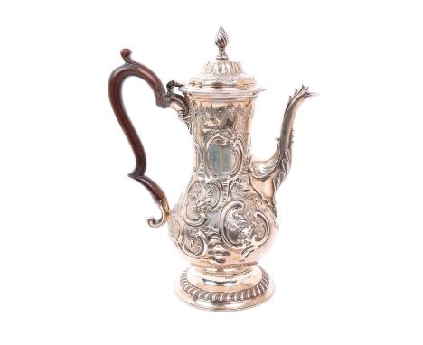 George II silver coffee pot of baluster form, with later chased decoration, hinged cover with flame finial and fruitwood hand