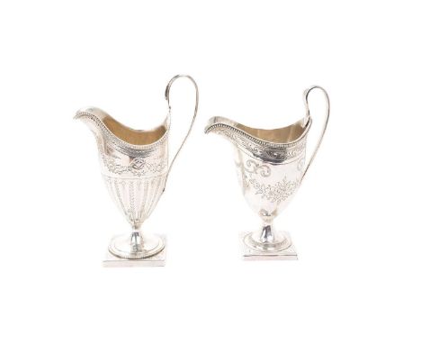 George III silver helmet shaped cream jug, with beaded border and bright cut decoration, on a square pedestal base (London 17