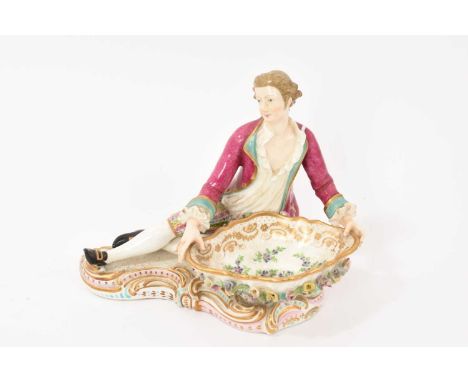 A Derby porcelain figural sweetmeat dish in the form of a seated figure, incised 'No. 13' to base, 14.5cm high, with 1965 Chr
