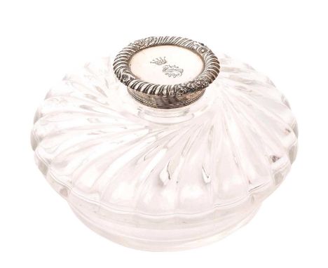 Large, late Victorian cut glass inkwell of circular form, with wrythen decoration and silver hinged cover with engraved coron