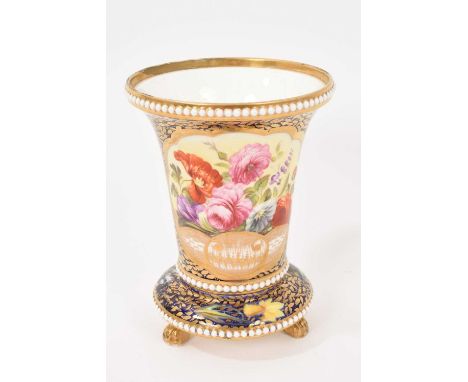 A Spode flared vase, pattern number 2575, circa 1815-20, boldly painted with flowers on a cobalt blue and gilt patterned grou
