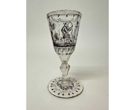 An 18th century Bohemian or Saxon Schwarzlot enamelled goblet, painted with a hunting scene, 14.5cm highSmall chips around th