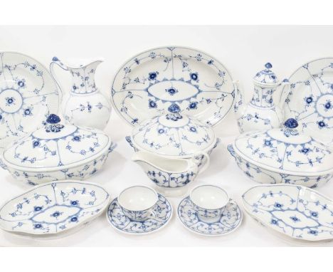 A Royal Copenhagen Blue Fluted Plain pattern dinner and tea service, including coffee pot, cups, saucers, water jug, dinner p