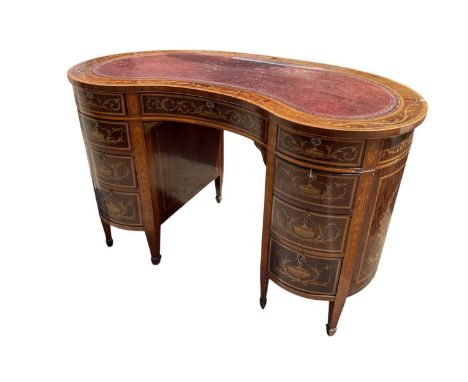 Edwardian mahogany and marquetry kidney shaped desk/dressing table, retailed by Edwards and Roberts, having nine drawers to t