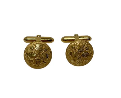 Pair of 1981 Royal Wedding gilt metal cufflinks decorated with P.O.W. crests and Spencer Arms with bar backs