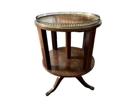 Edwardian mahogany circular revolving bookcase, with brass gallery and tripod cabriole base on castors, 46cm diameter x 66cm 