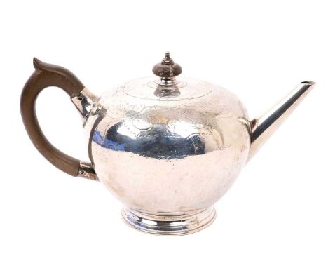 Victorian silver bullet tea pot with engraved floral decoration, hinged flush fitting cover, straight spout and wooden handle