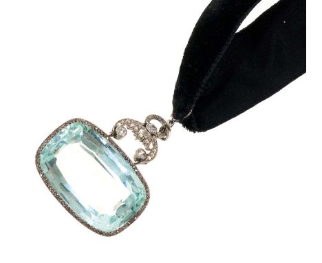 Fine Edwardian aquamarine and diamond pendant, the large cushion-cut aquamarine measuring approximately 32mm x 21.5mm x 13.7m