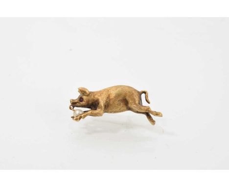 Unusual Victorian novelty 15ct gold brooch in the form of a pig, naturalistically modelled as a running pig, with garnet eye 