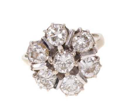 Diamond cluster ring with a flower head of seven brilliant cut diamonds estimated to weigh approximately 2cts in total, in 18