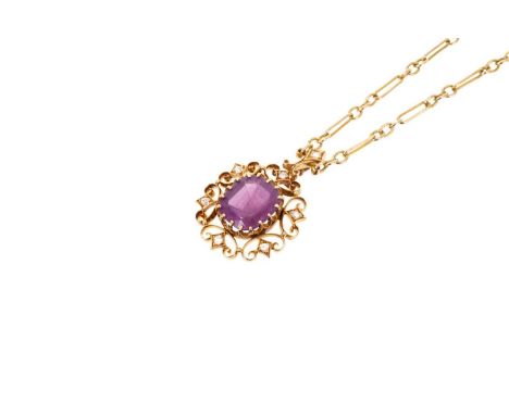 Victorian amethyst and diamond pendant on chain, the mixed cut amethyst in an openwork gold scrolls with rose cut diamonds, t