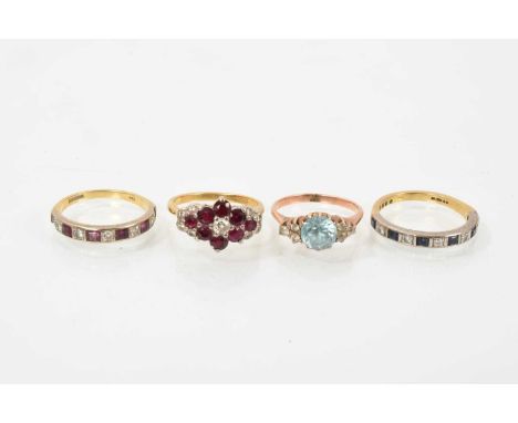 Ruby and diamond cluster ring, Ruby and diamond eternity ring, sapphire and diamond eternity ring and a blue zircon ring (4)S