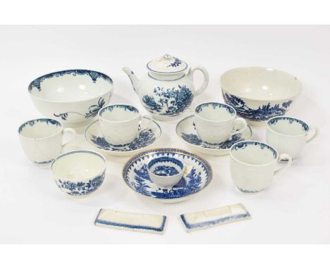 A group of 18th century Worcester and Caughley blue and white porcelain, including a Worcester Fence pattern teapot, a Caughl