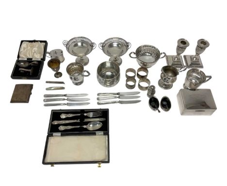 Selection of miscellaneous silver including two christening mugs and bowl, pair of silver dwarf candlesticks, pair of pedesta