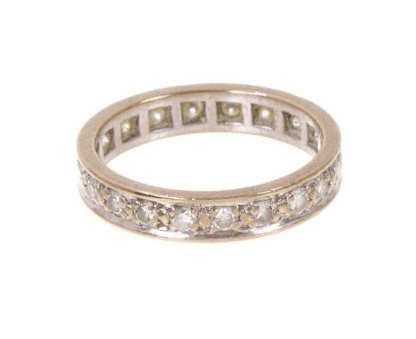 Diamond eternity ring with a full band of brilliant cut diamonds in 18ct white gold setting, ring size K.Not hallmarked but t