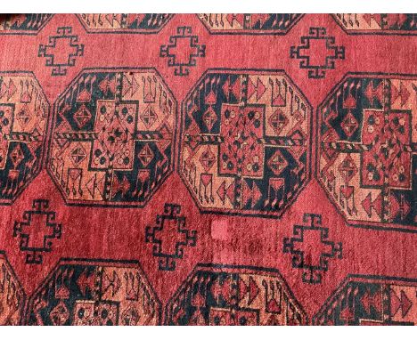 Bellouche type rug with three rows of seven quartered medallions, 320 x 220cm