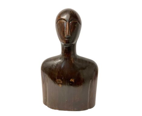 Oriental wooden mannequin, carved in hardwood with stylised features, 62cm highSmall losses to lower edge. General wear and s