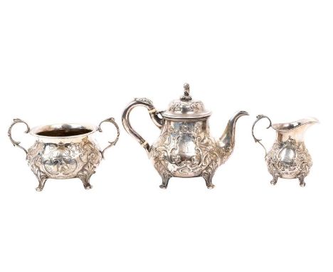 Unusual Victorian three piece silver bachelor teaset, comprising teapot of baluster form, with chinoiserie revival decoration