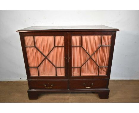 19th century mahogany collectors' cabinet, with central bank of eight graduated drawers, enclosed by a pair of fabric lined a